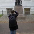 315-0587 Posing with Statue of John Harvard.jpg